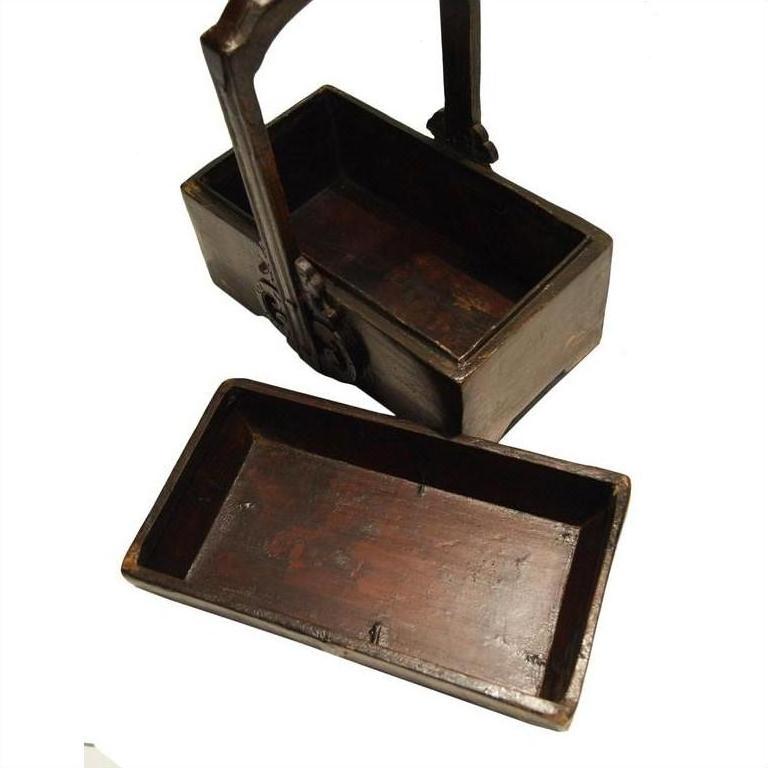 Brown wooden box with handle and separate lid, antique Chinese style, displayed on a white background.