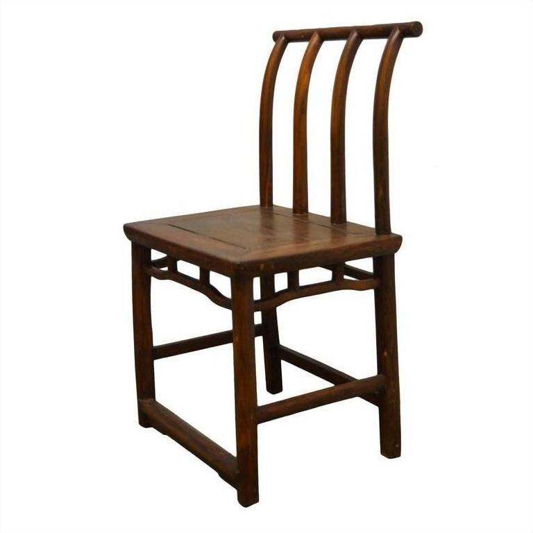 Brown wooden antique Chinese handmade chair with curved back, three vertical slats, and square seat, studio view.