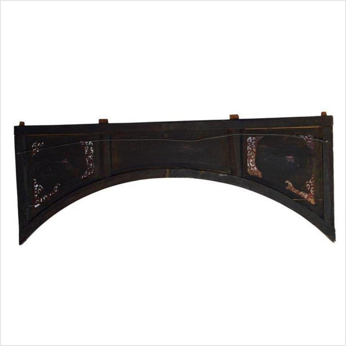 Dark wood hand-carved Chinese sign with curved shape, painted floral corners, and wire on back.