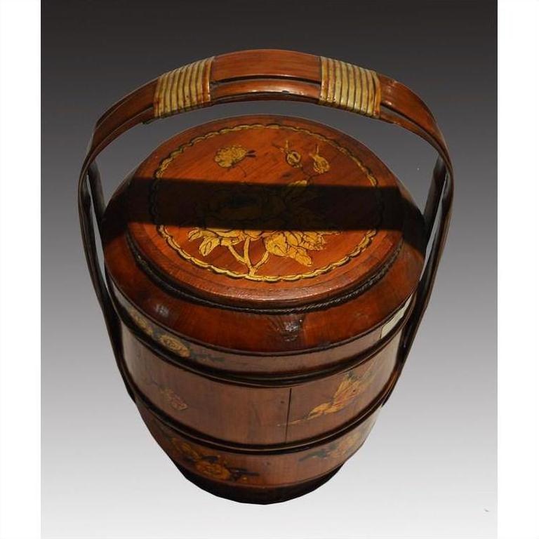 Hand painted bamboo basket with curved handle and floral lid, antique Chinese style, top view.