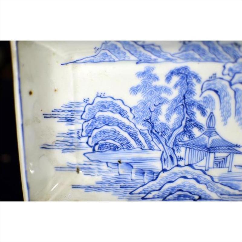 Blue and white porcelain tray with landscape scene, pavilion, and willow trees in antique style design.