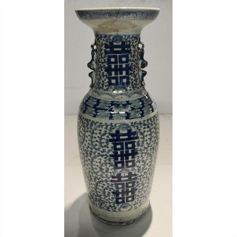 Blue and white ceramic Chinese antique vase with hand-painted geometric and floral patterns on body and neck.