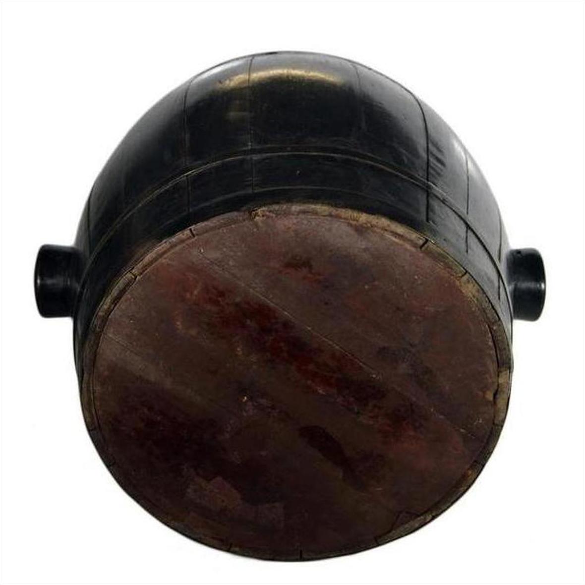 Brown varnished wood Chinese barrel with side handles, 19th century, round base shown in close-up from below.