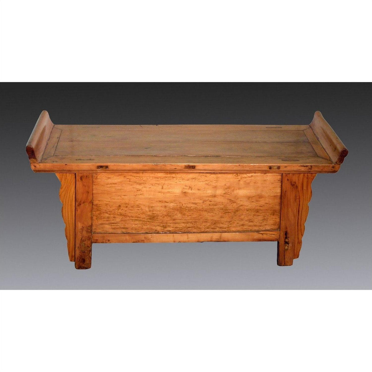 Dark wood Chinese Kang low cabinet with flat top, everted flanges, and decorative side panels on plain background.