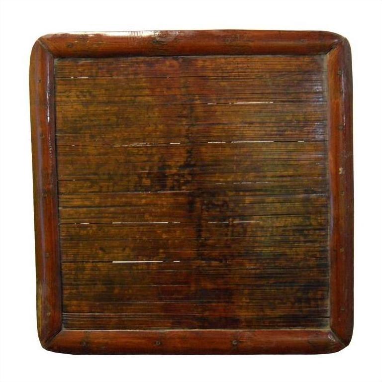 Brown wood and bamboo square ceremonial table with vintage finish, low height, shown indoors.