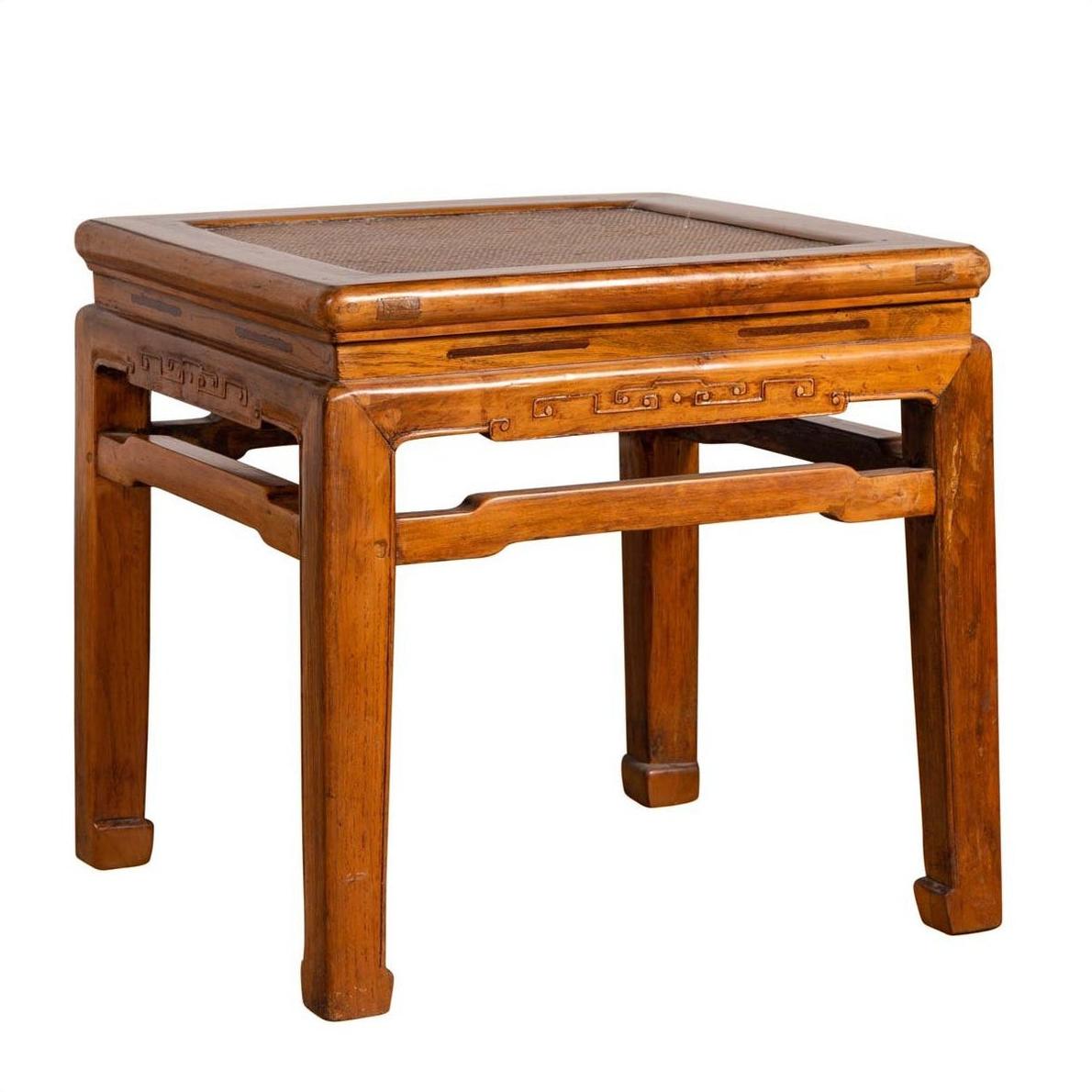 Brown elmwood Ming style side table with waisted apron and horsehoof legs, antique Chinese furniture piece.
