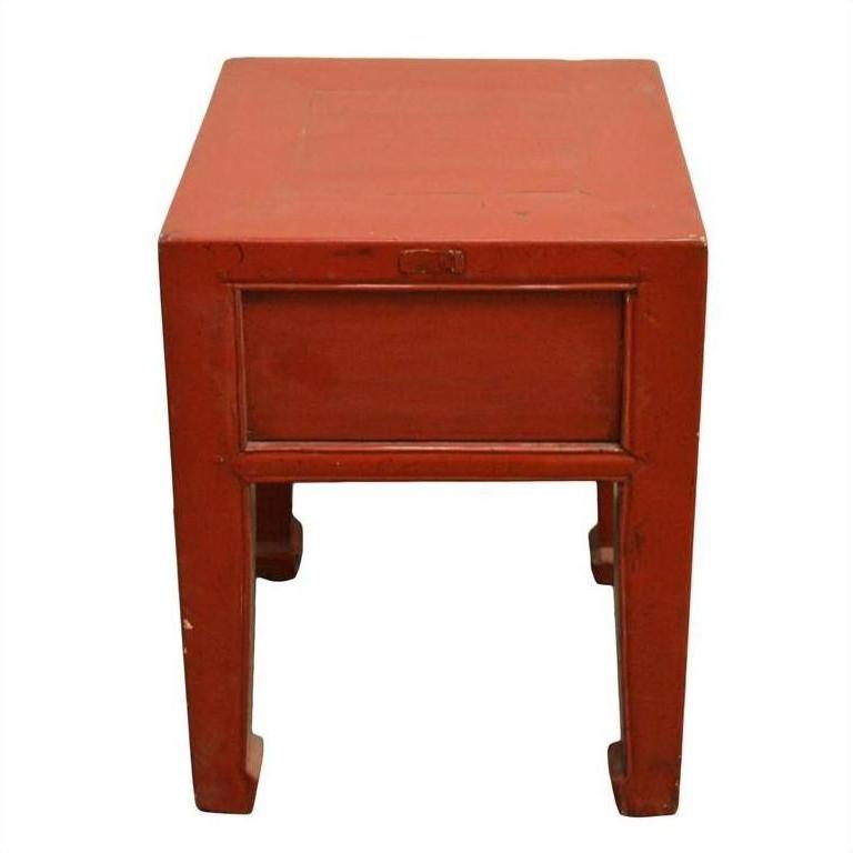 Red lacquer wood side table with square legs, small size, front view.