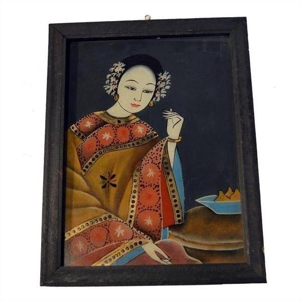 Colorful glass painting showing a woman in ornate traditional dress holding a flower, with sweets beside her.