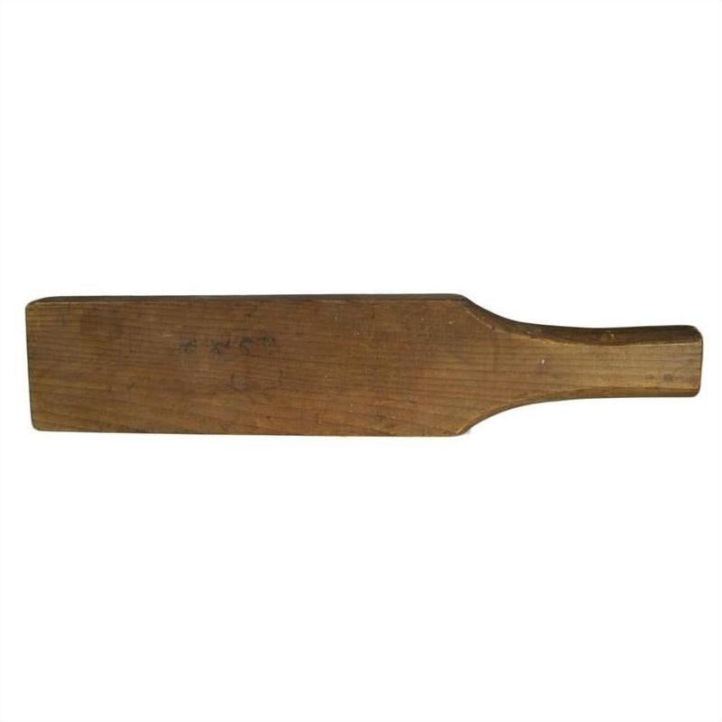 Light wood antique Chinese rice mold with three round character stamps, close-up.