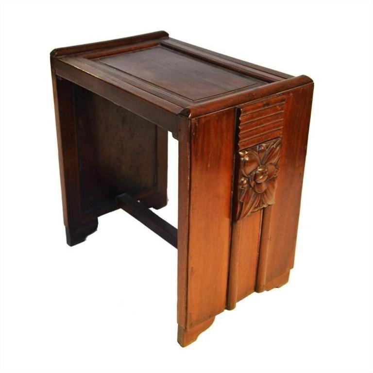 Dark brown rosewood side table with carved floral details and rectangular legs, antique style.