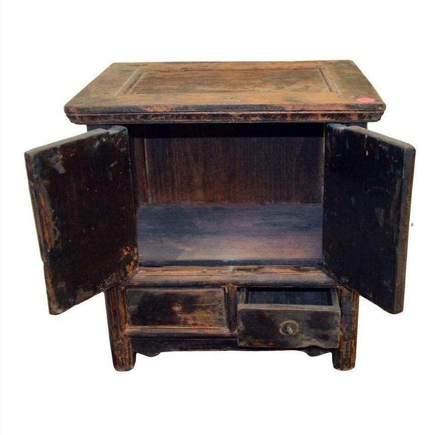 Rustic wood Chinese side cabinet with two open doors above and two small drawers below, antique finish.
