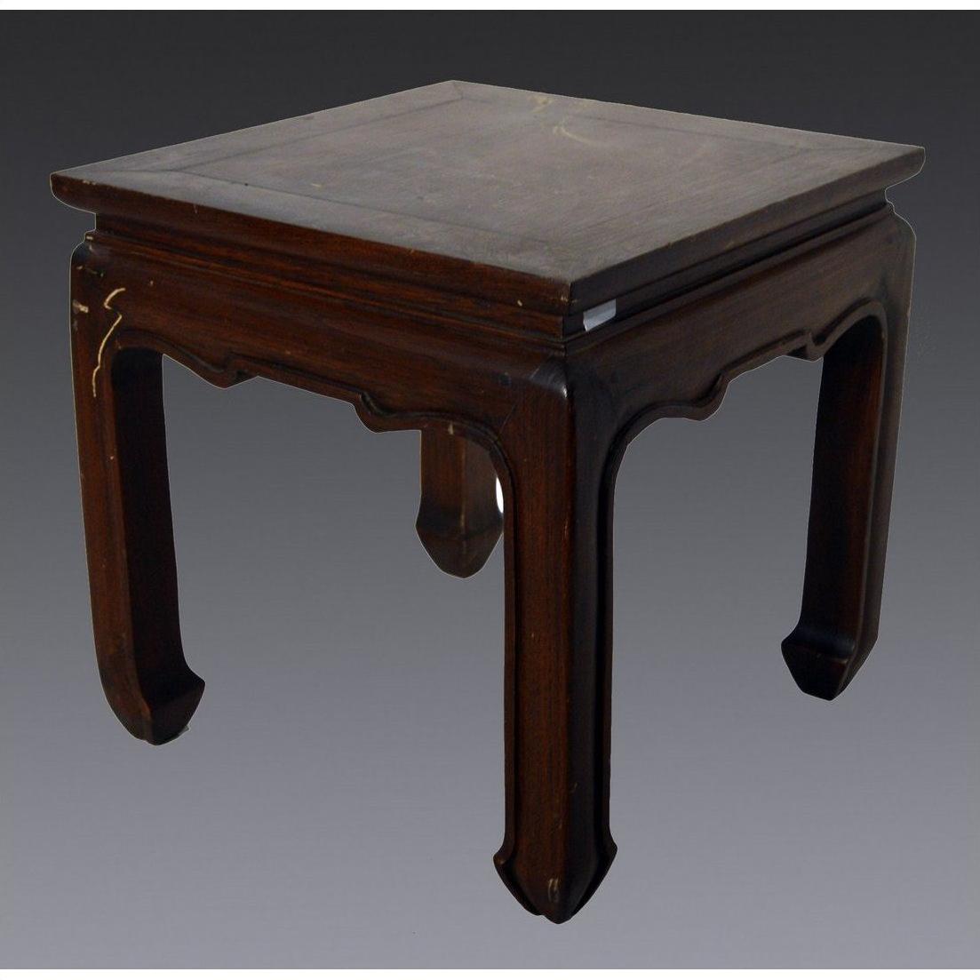 Dark wood Chinese antique square side table with horse hoof legs, set against a plain gray background.