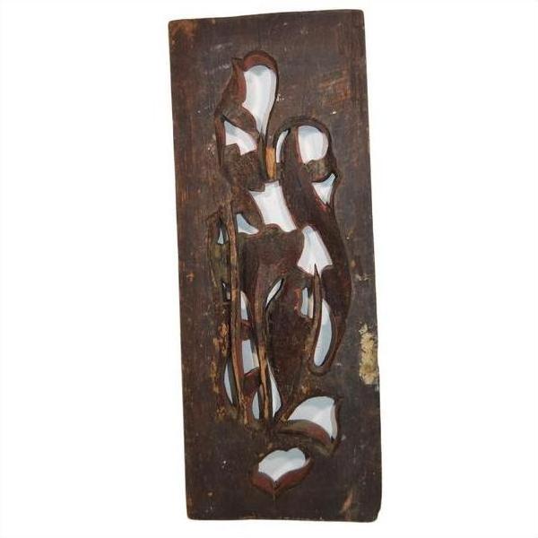 Brown wooden rectangular panel with abstract carved shapes, rustic finish, vertical peony spray design, close-up view.