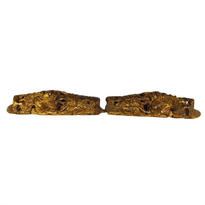 Brown wood antique Chinese temple carvings with dragon designs, displayed side by side on a white background.