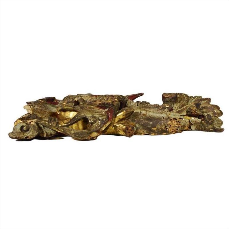 Gold and red fish motifs on white carved and painted wood, antique Chinese temple carvings pair, close-up view.