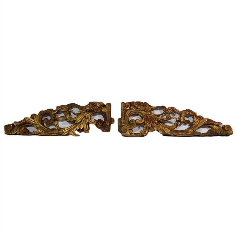 Gold-painted wood Chinese temple carvings, ornate design, pair displayed side by side on white background.