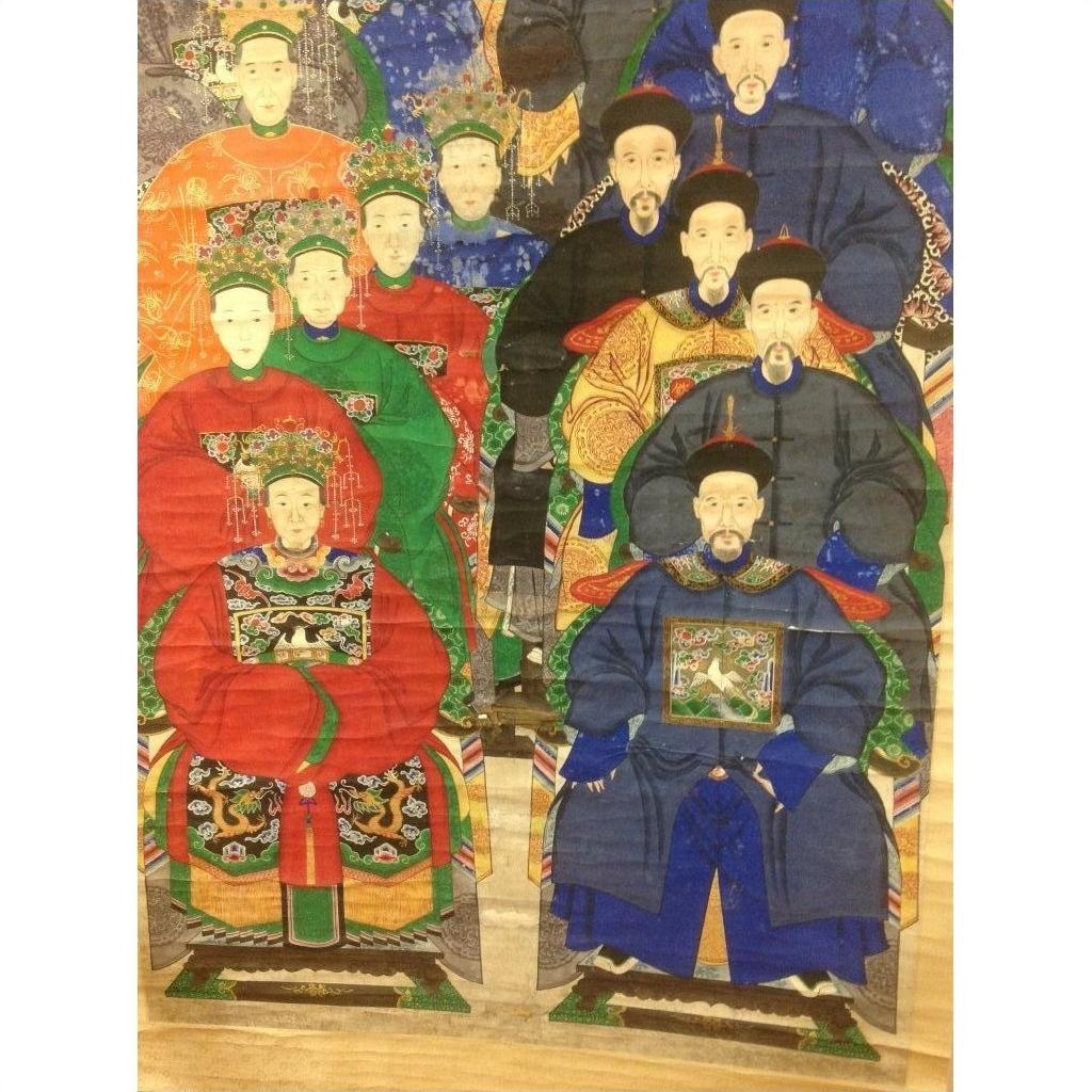 Colorful silk Chinese wall hanging with nine people in ornate robes, group portrait design.