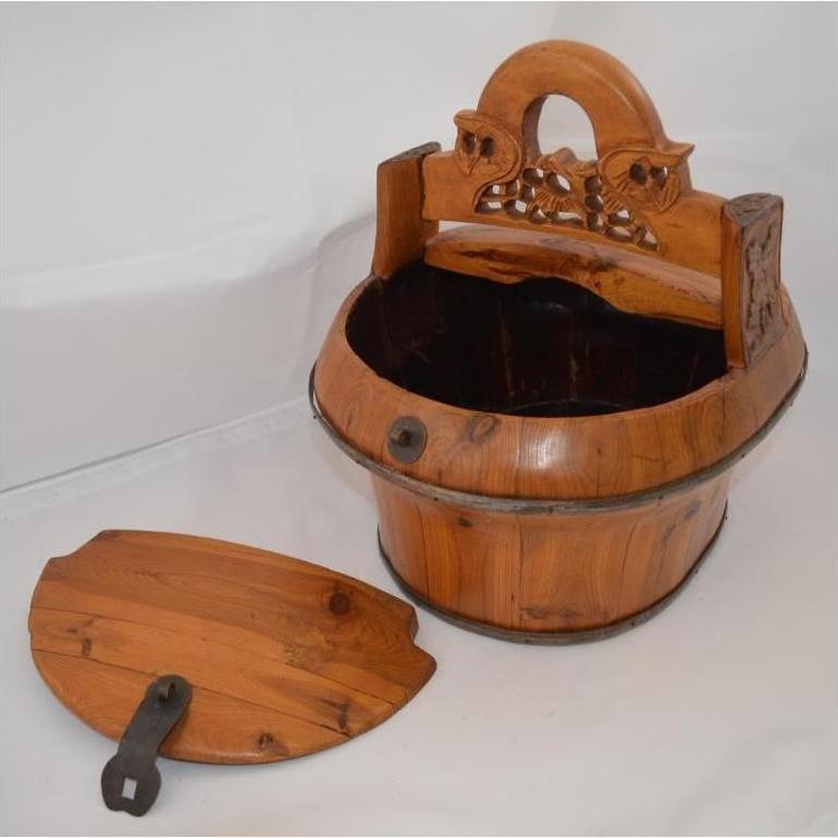 Brown wooden Chinese wedding basket with decorative handle and matching lid, shown on a white background.