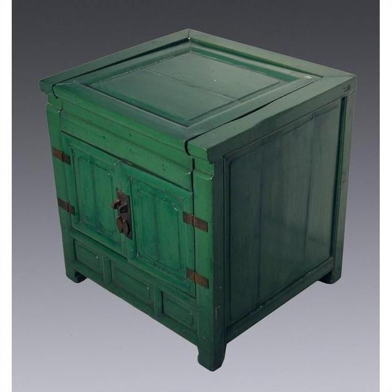 Green lacquer antique cabinet with double doors, metal hinges, and lock, set against a plain gray background.