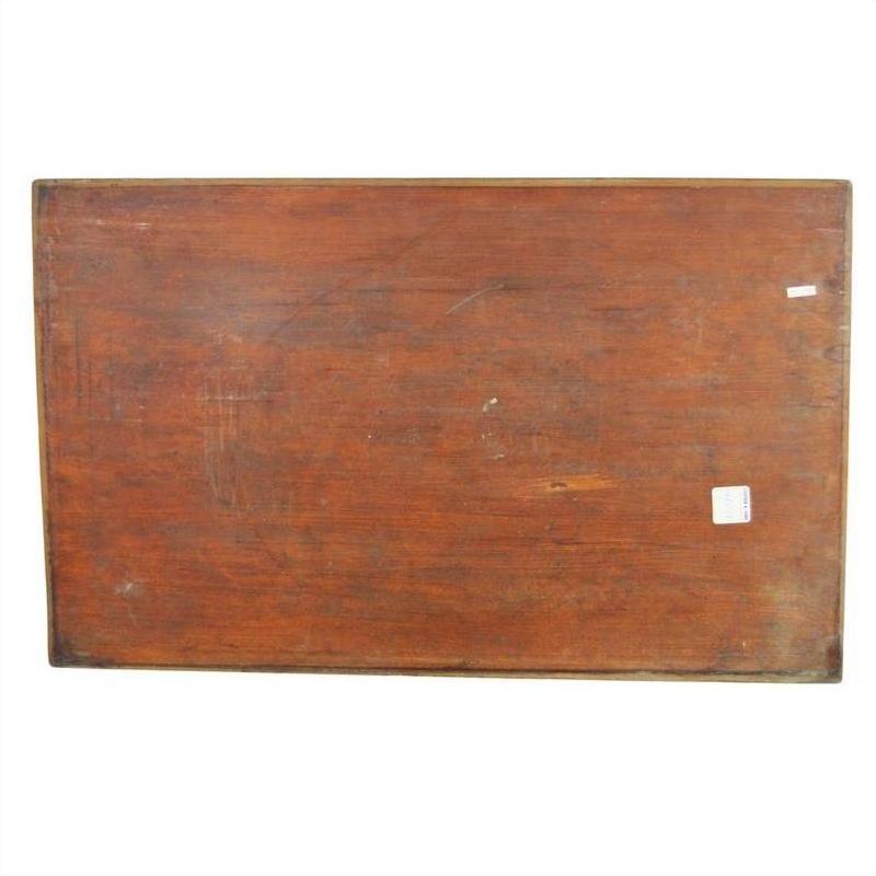 Dark rosewood wall plaque with hand-carved details, lacquered finish, worn surface, two small white stickers on right.