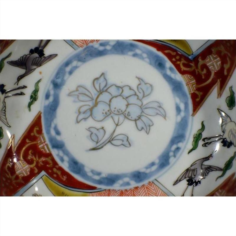 Blue and white porcelain Imari bowls set of 4, hand painted with floral, crane motifs and geometric borders.