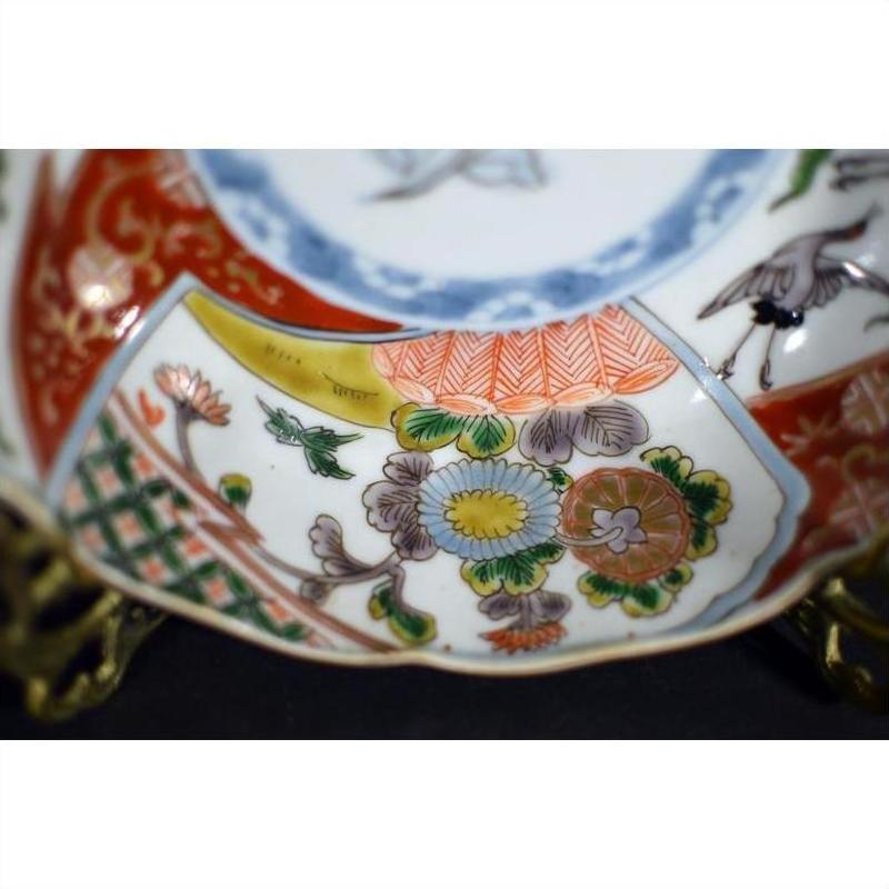 Colorful porcelain Japanese Imari bowls set of 4 with hand-painted floral, geometric patterns displayed together.