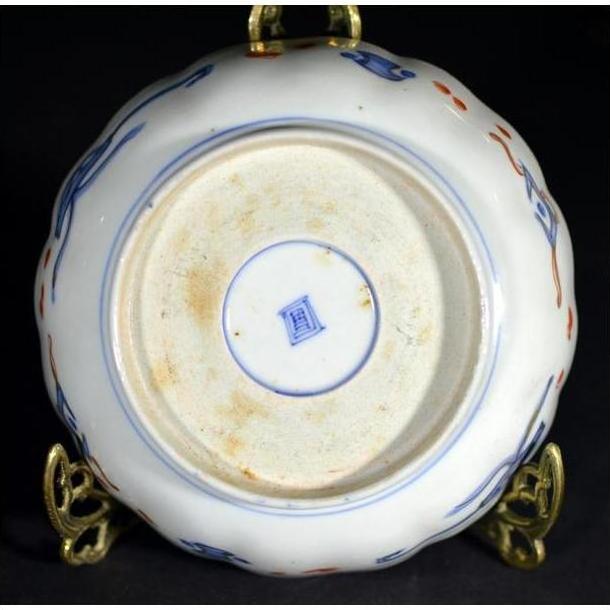 Blue and white porcelain bowl underside with central square blue mark, hand painted Japanese Imari style.