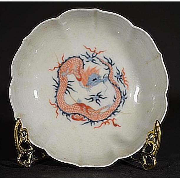 Set of 4 multicolor hand painted porcelain Japanese Imari bowls with dragon designs on decorative stands.