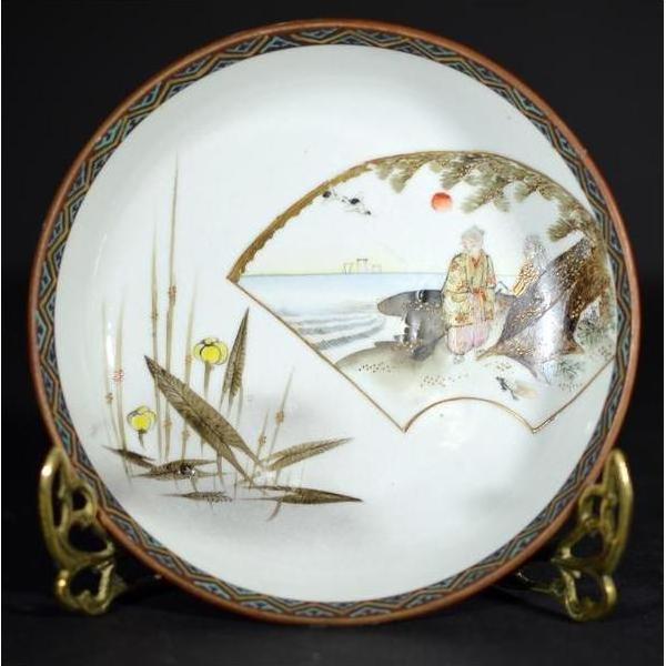 Multicolor porcelain Kutani bowl with hand-painted man by the sea, birds, plants, sun, and geometric border design.