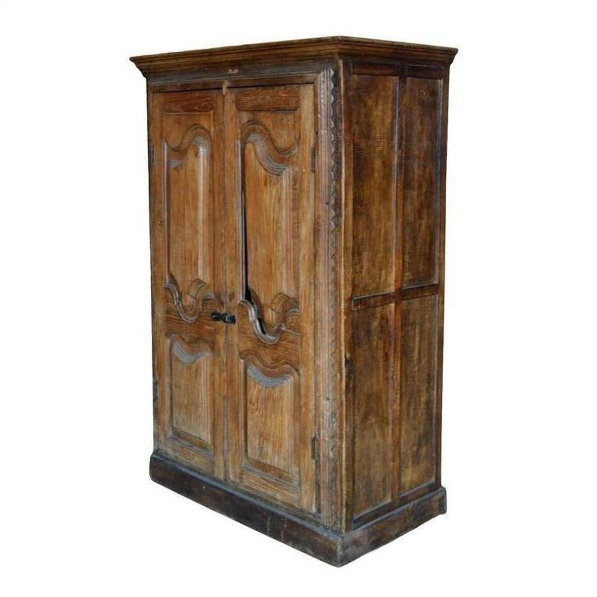 Brown wooden antique Indian cabinet with carved doors, rustic 19th-century style, weathered finish, front view.