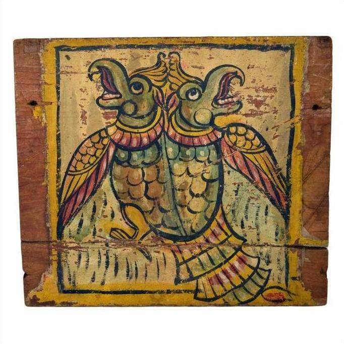 Colorful painted wood shrine from New Delhi, India, decorated with folk art of a two-headed fish, antique finish.