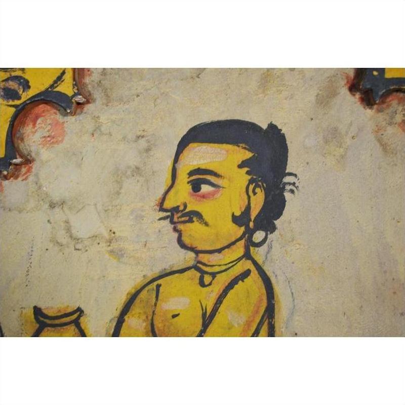Colorful ancient wall painting of a man wearing jewelry, holding a pot, similar to Antique Indian Wood Shrine art.