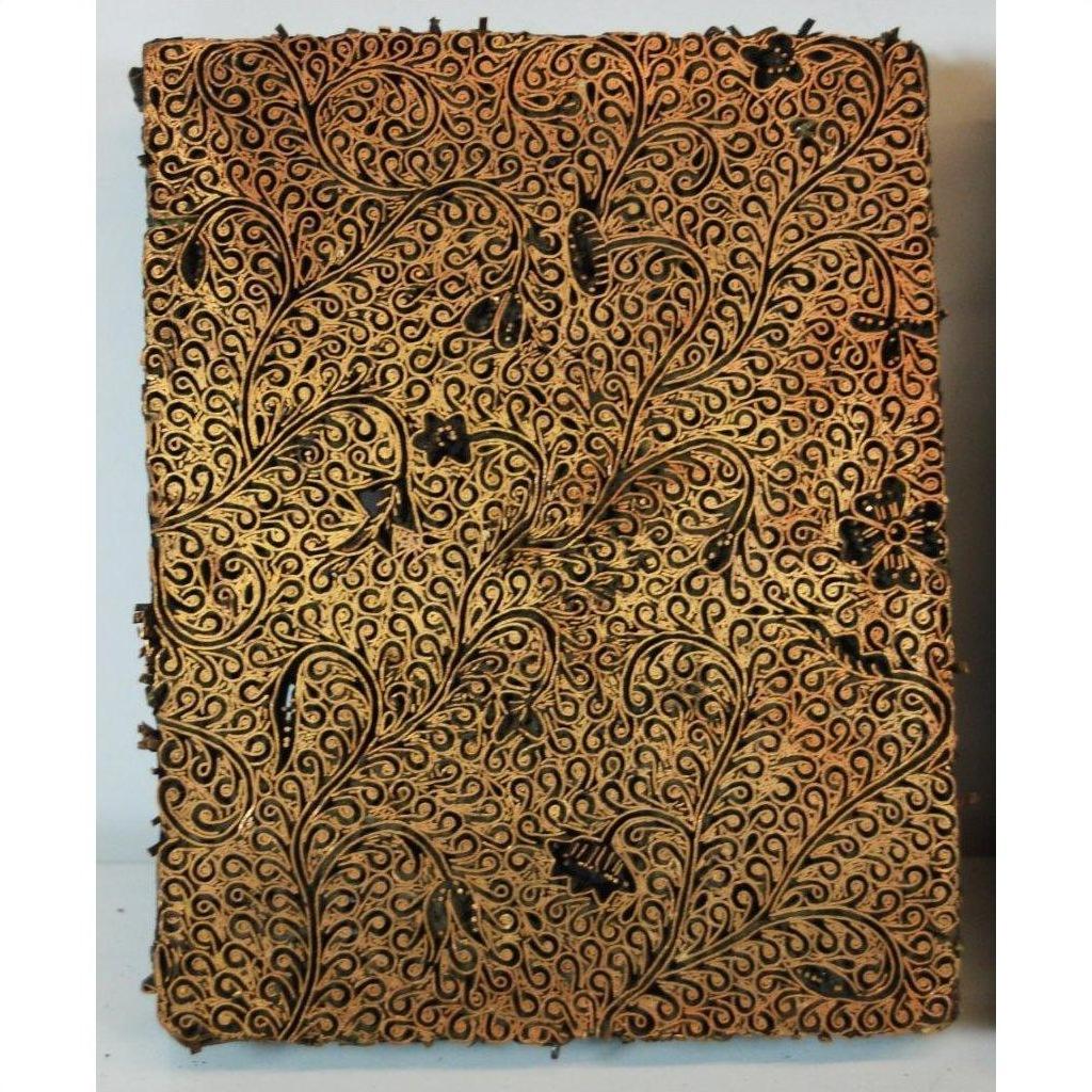 Brown and gold copper batik ink blocks with intricate floral and vine patterns, set of 3, close-up.