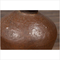Antique Japanese Brown Oil Jar with Weathered Appearance and Irregular Shape