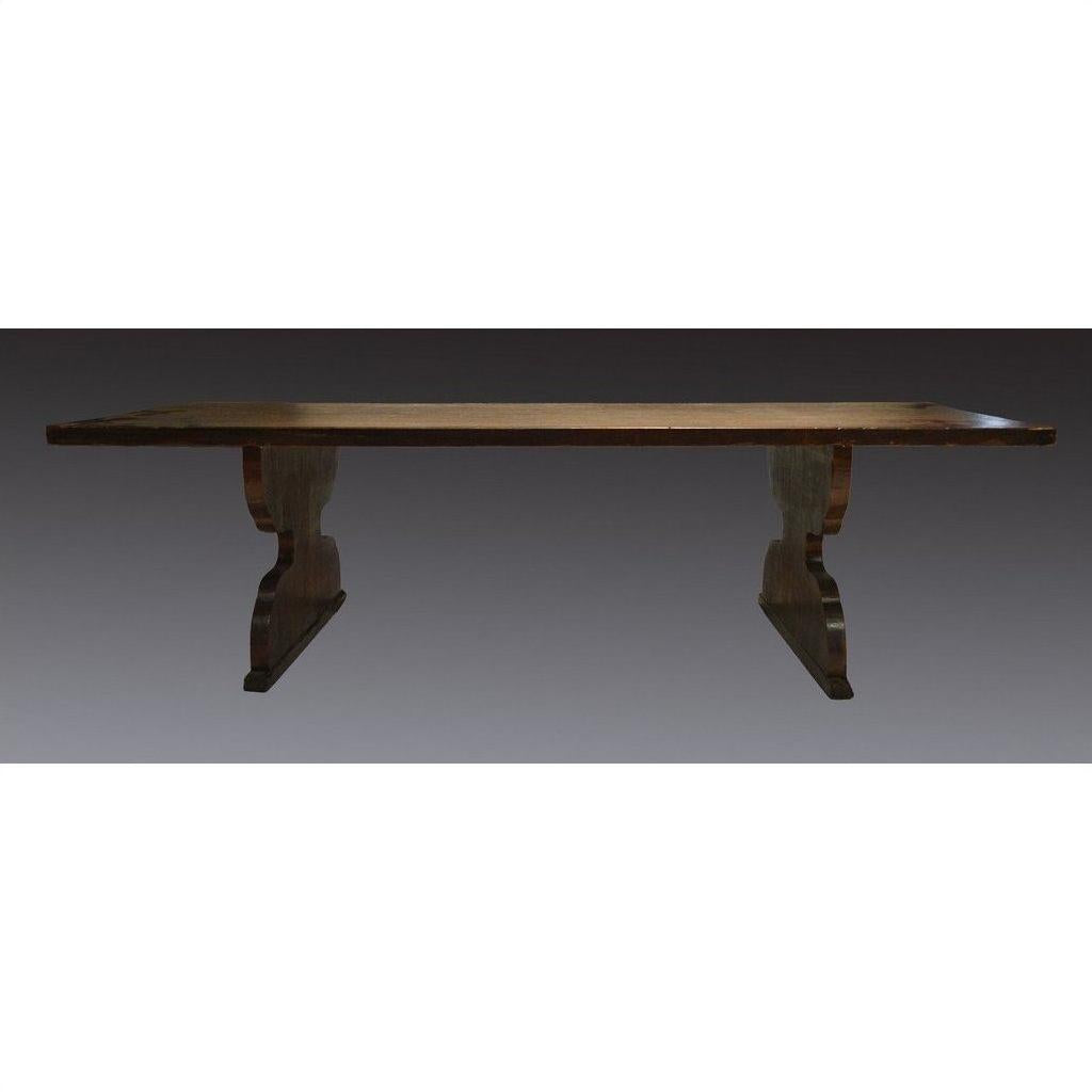 Brown wooden Japanese antique desk with rectangular top and two thick legs, displayed against a gradient gray background.