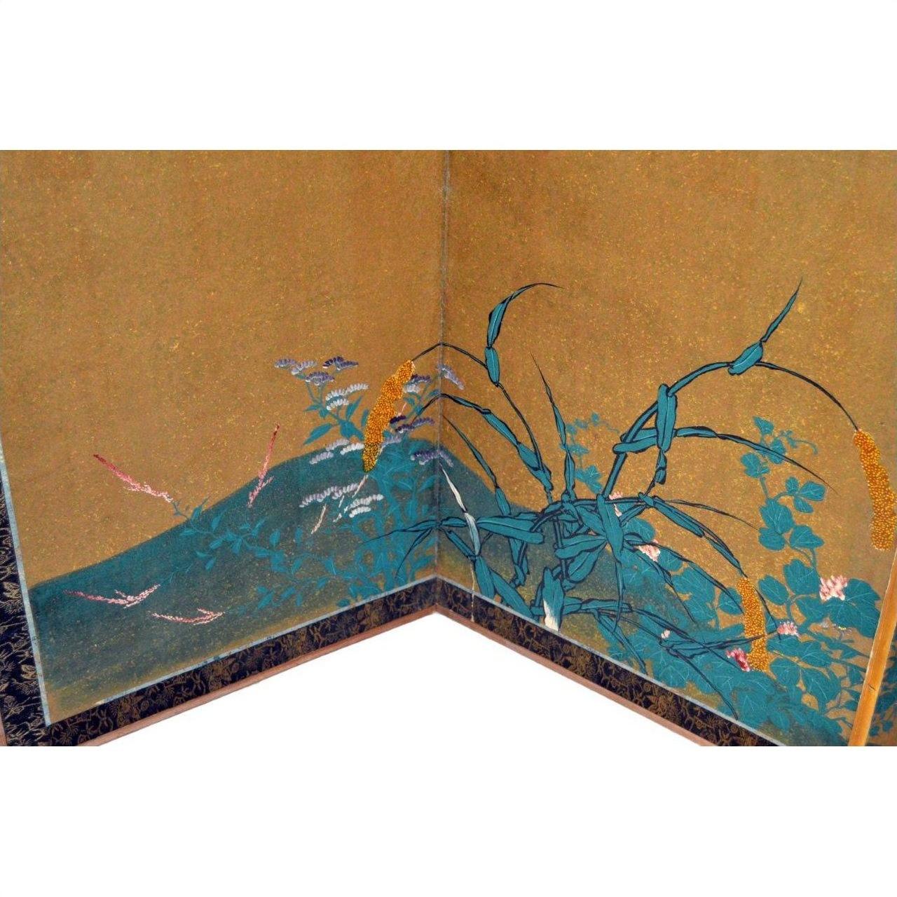 Gold rice paper screen with tall green plants and yellow and pink flowers, Japanese antique decor.