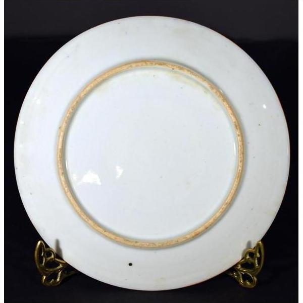 White porcelain Japanese Igezara transferware plate, minimalist back design, displayed on gold stand.