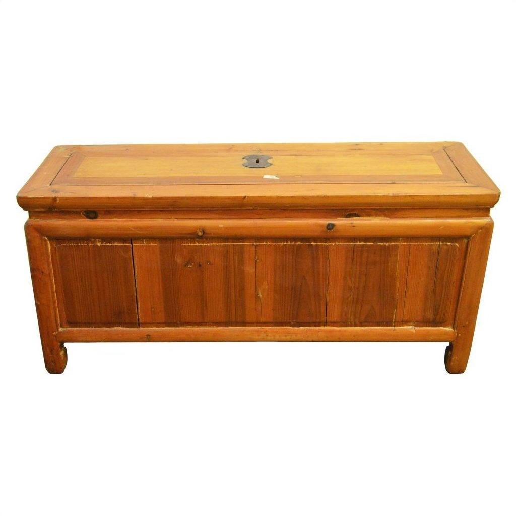 Dark wood antique Chinese Kang chest with brass hardware, drawers, paneled doors, and keyhole front, front view.