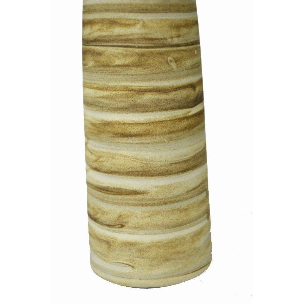 Beige and brown ceramic vase with marbled swirled pattern, large cylindrical shape, earth tone close-up.