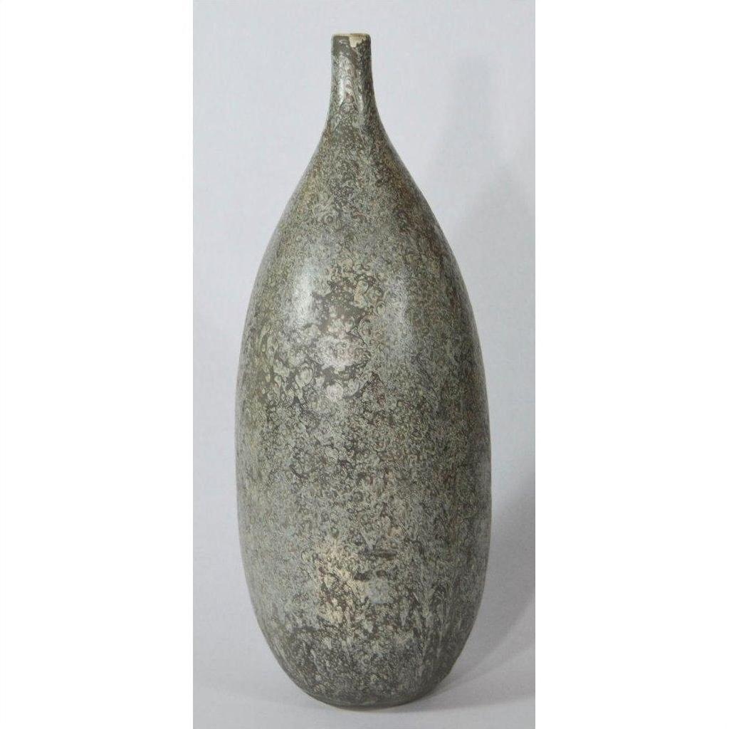 Close-up of large ceramic vase with narrow neck, mottled gray textured surface, set against a plain background.
