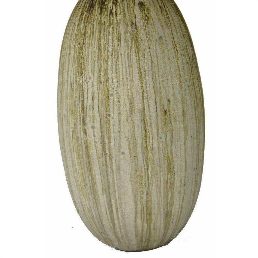 Close-up of tall oval unglazed ceramic vase with smooth surface and vertical brown streaks.