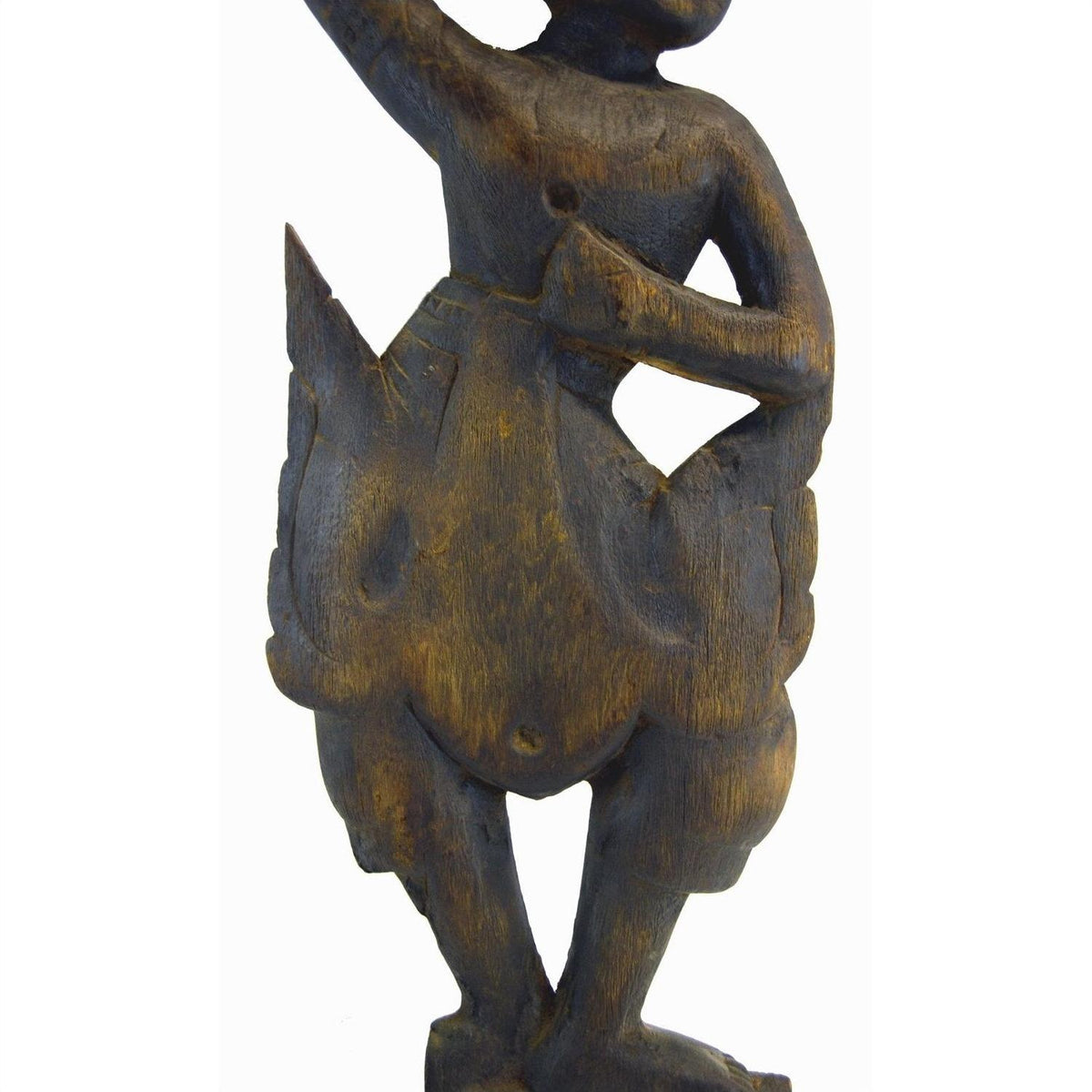 Wooden Balinese hand carved temple dancer figure with bent arms and legs in a skirt, white background.