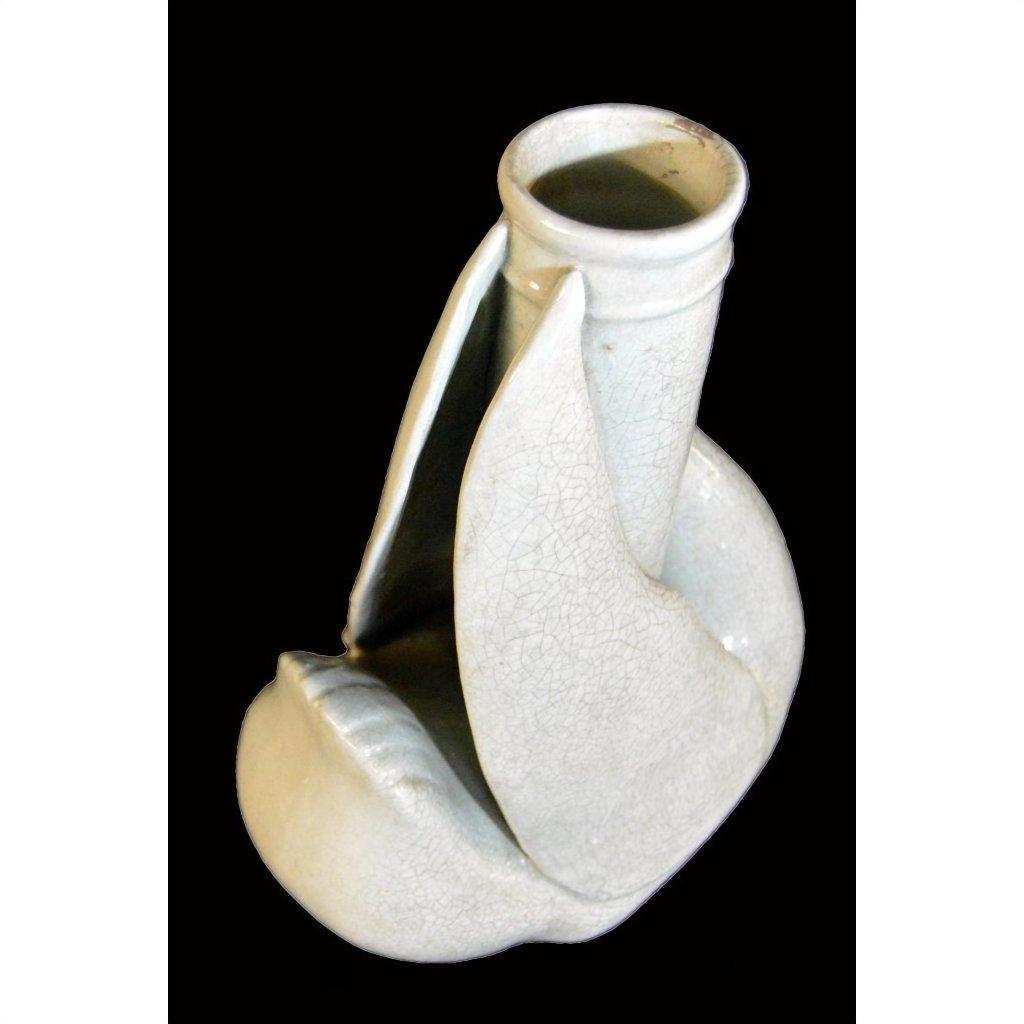White porcelain vase with cracked glaze and abstract folded design, shown against a plain background.