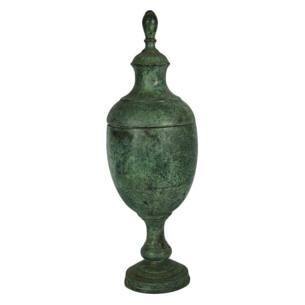 Bronze antique-style urn with lid and pedestal base, close-up view showing classical design, very good condition.