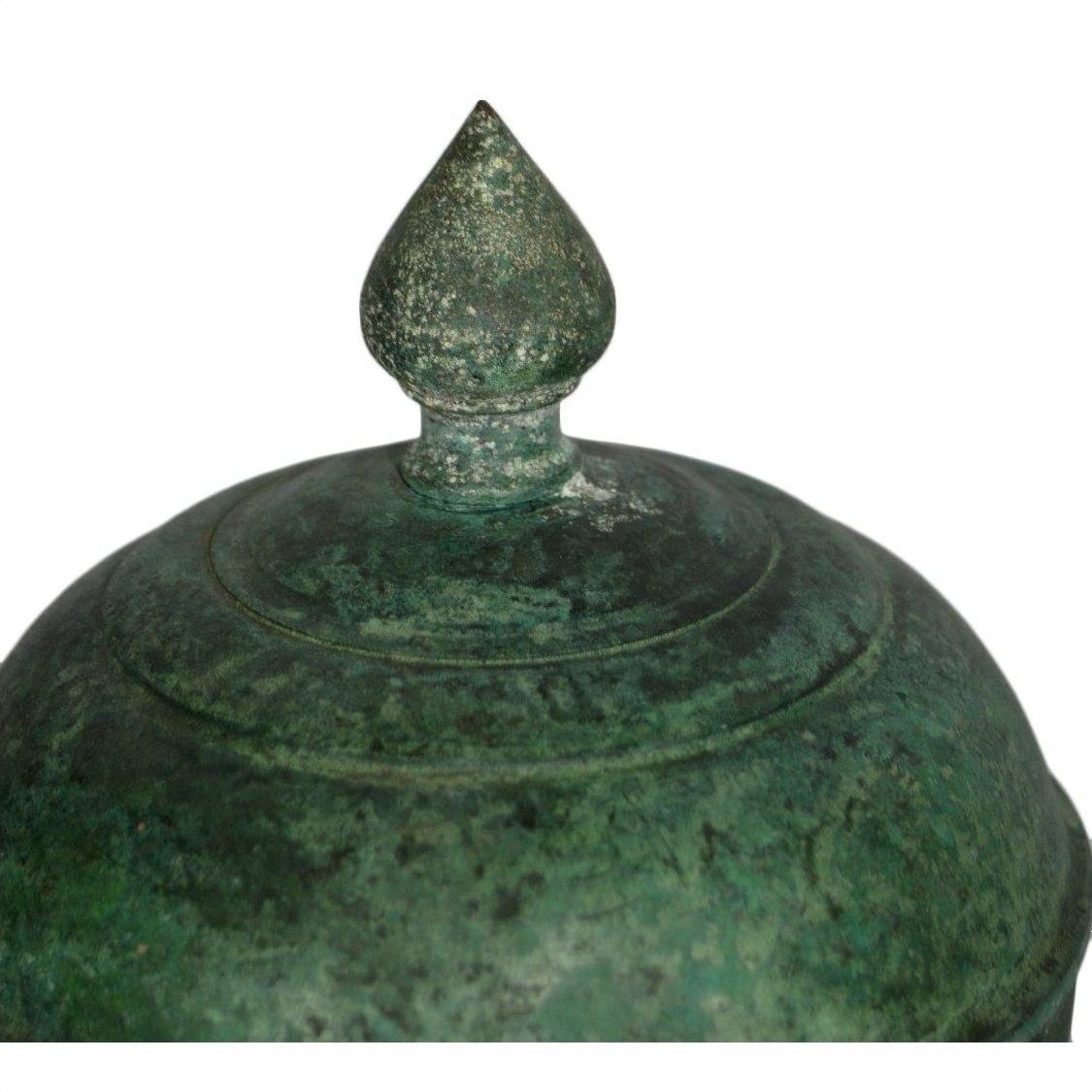 Close-up of bronze urn lid with verdigris patina and pointed knob, Lost Wax Cast technique.