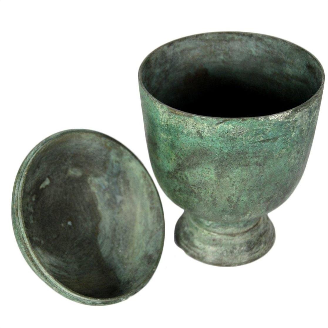 Close-up of green patina bronze urn with matching lid, lost wax cast, showing aged antique finish.