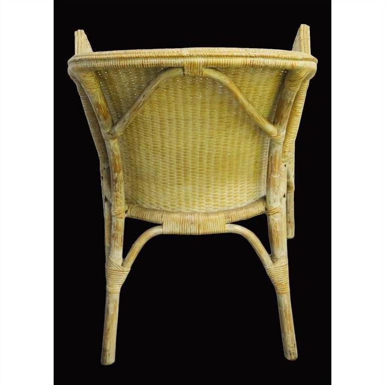 Brown rattan chair with woven back and seat, rear view against a solid black background.