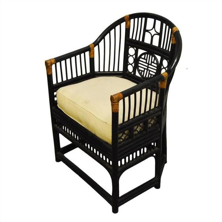 Brown rattan side chair with a curved back, beige cushion, and modern geometric patterns, indoor setting.