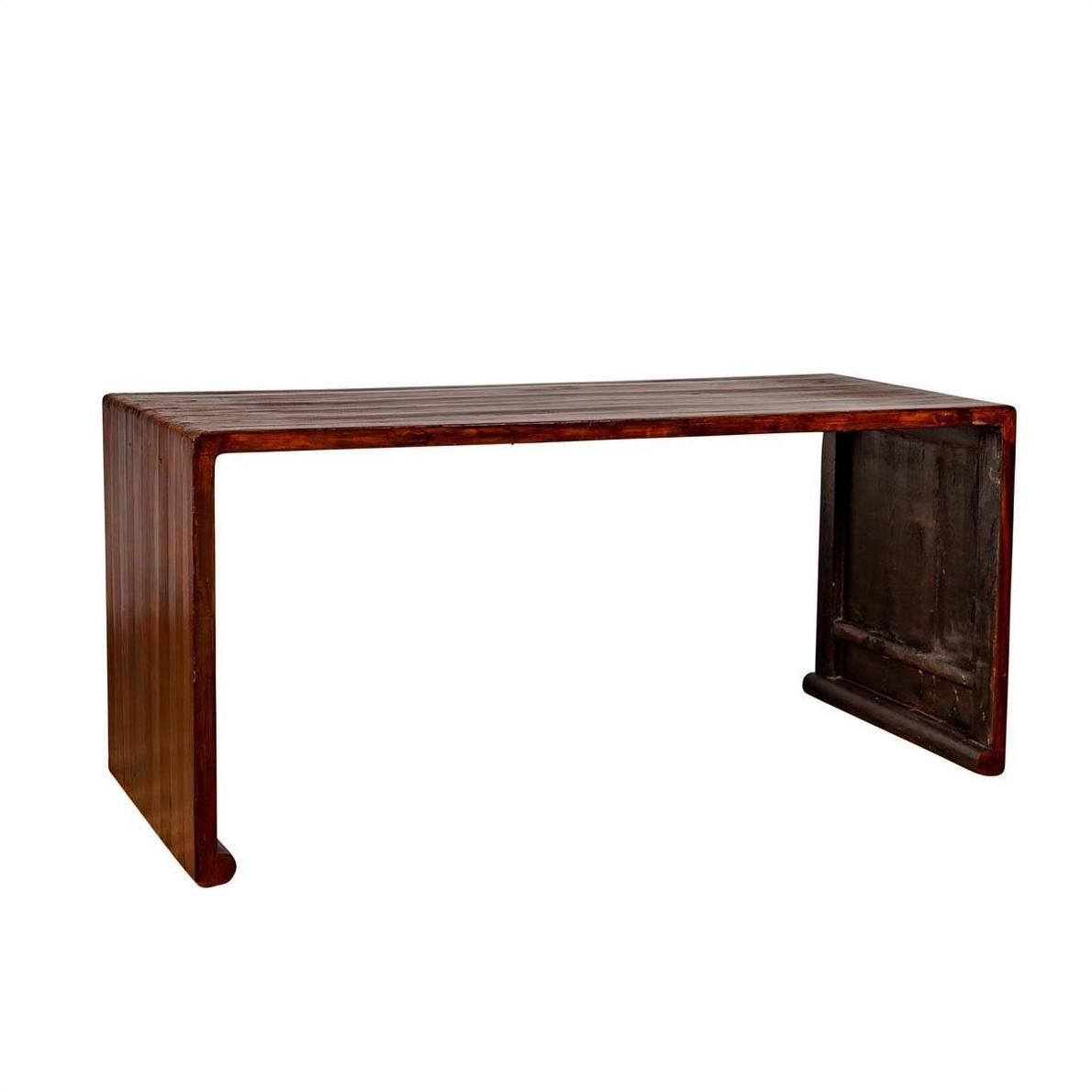 Dark wood Burmese vintage waterfall console table with scrolling feet, displayed against a plain white background.