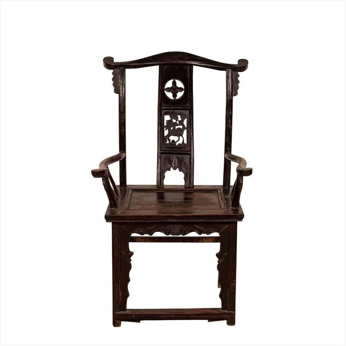 Dark patina Chinese elmwood Dengguayi scholar's chair with ornate carvings and curved armrests, front view.